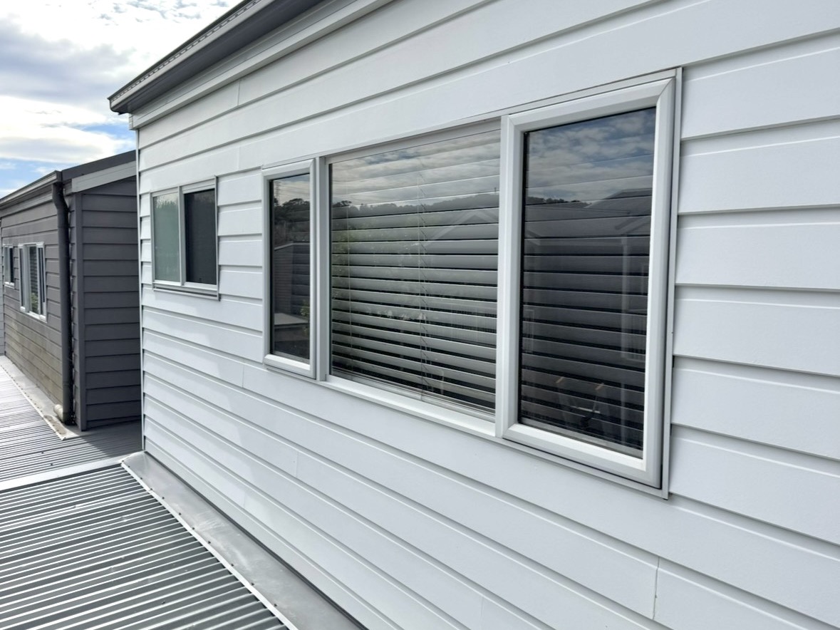 Clean, bright weatherboard cladding after house washing in Newcastle